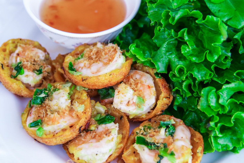 Eating Banh Khot In Vietnam